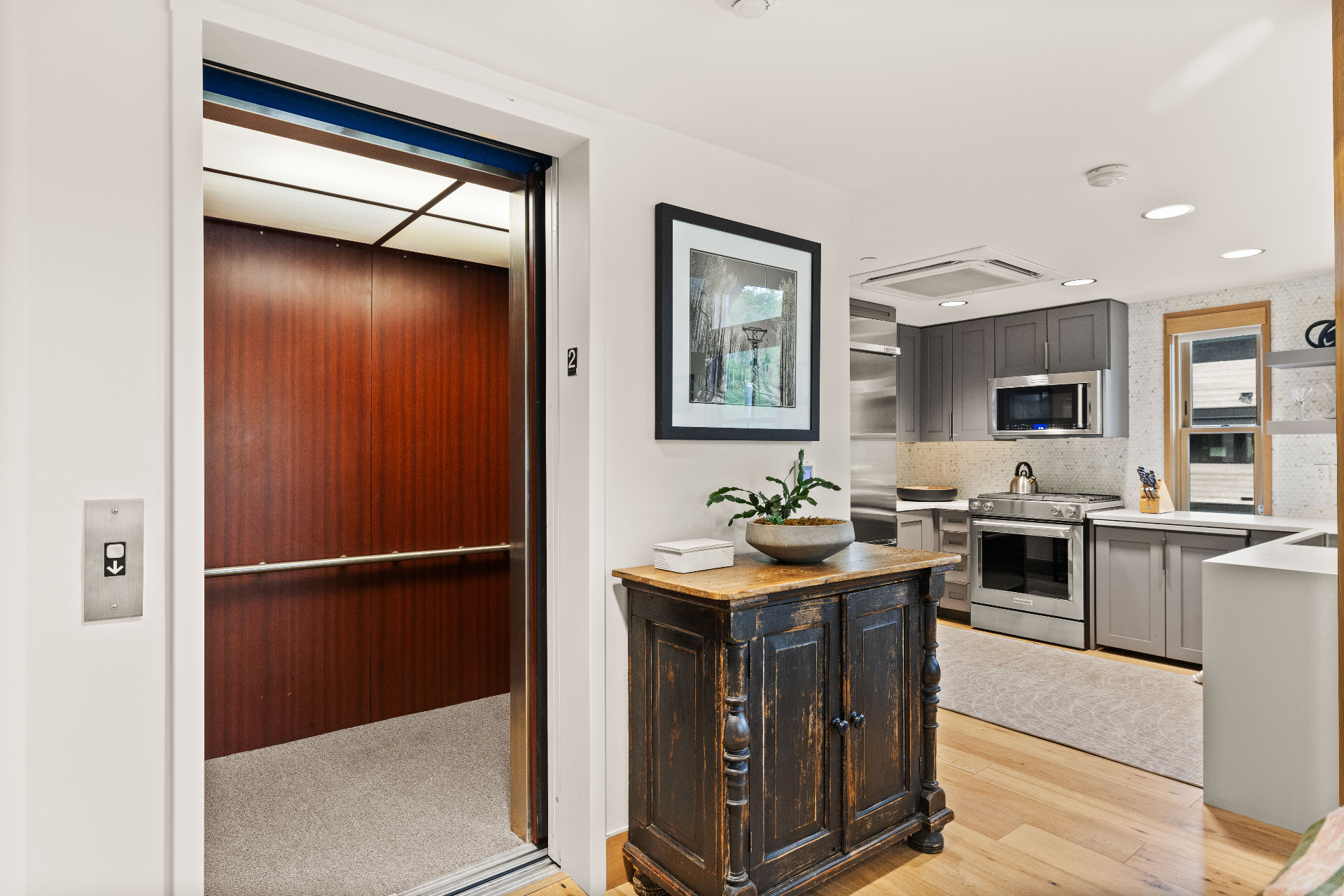 Private elevator entrance and kitchen